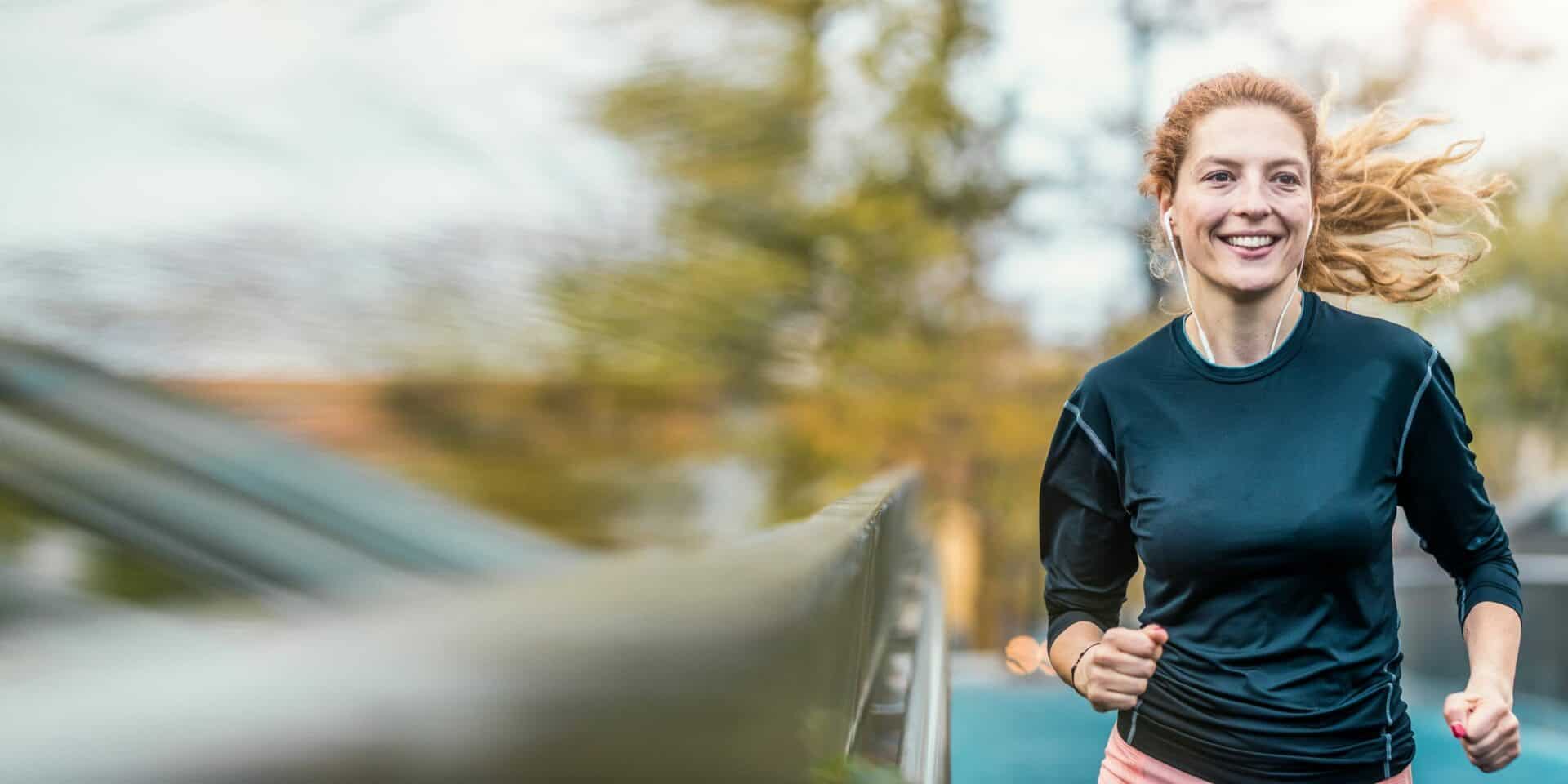 Female Athlete Running Outdoors