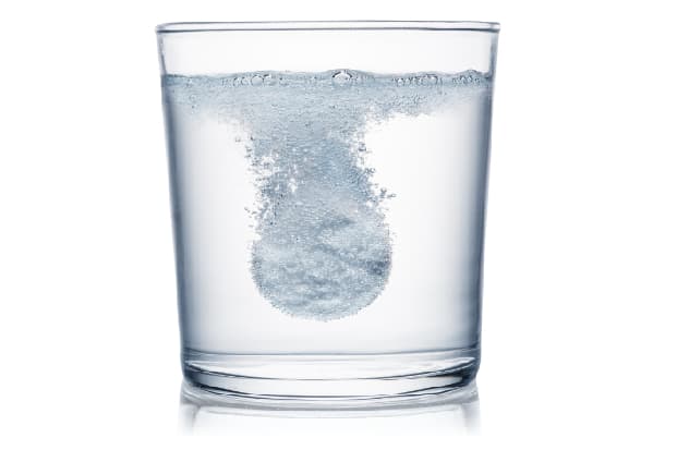glass of water with vitamins